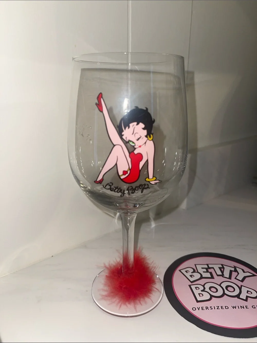 Betty Boop Clear Wine Glass with Red Artwork and Red Feather Base